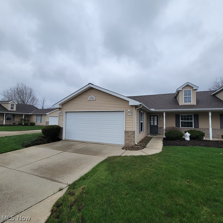 This vinyl-sided attached ranch condo offers comfortable one-floor living with a functional and efficient layout. The home features a two-car attached garage, an eat-in kitchen, and a living room that flows into a sunroom, providing additional space to relax or entertain.  The property includes two bedrooms and is designed for easy, low-maintenance living.  The home needs updating, presenting a great opportunity for buyers to personalize and add value. Property is being sold in its present condition.