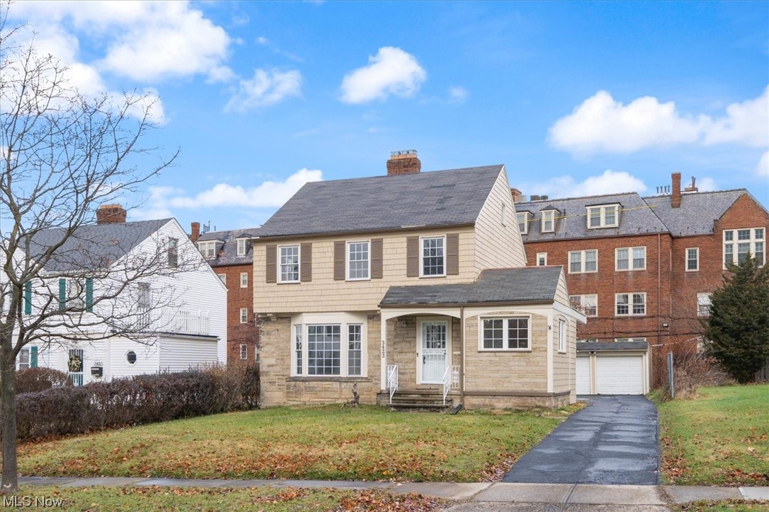 Get ready for comfortable living in Shaker Heights! This 4 bedroom, 1-1/2 bathroom home with an attached deck and 2 car garage has all the space you need. The entrance to the home greets you with a foyer large enough to hang coats, store shoes and even has a half bath. This leads to the eat-in kitchen where you can enjoy your morning coffee or to the newly carpeted recreation room in the partial finished basement. It doesn't stop there, as your new space also has a formal dining room, large living room with a bay window and a first floor newly carpeted bedroom that could also be used as a computer or playroom. Upstairs you will find the full bathroom and 3 bedrooms well-lit bedrooms two of which have larger closets. the property completes itself with a laundry room in the basement and is conveniently located off of Chagrin Boulevard near local shopping, dining and transportation. Bring your local agent to view!