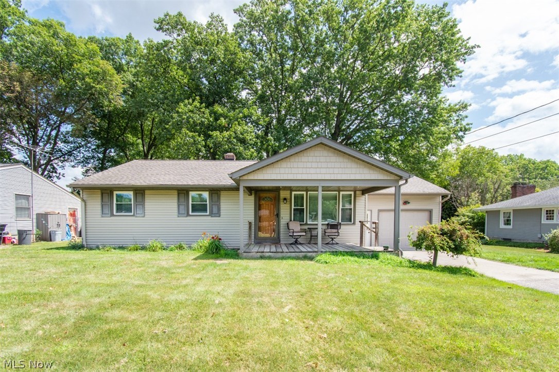 Austintown Schools, totally UPDATED  ranch home on quiet street with great front and back porch and large lot .  Spacious living room with great wood floors and eat in kitchen with newer cabinets, stainless steel appliances , granite counters and porcelain tile floors. Full bath tiled and updated. The master bedroom which was converted from a second bedroom to make this one extra large room .  Newer roof, vinyl windows, siding, furnace , AC . All appliances stay.