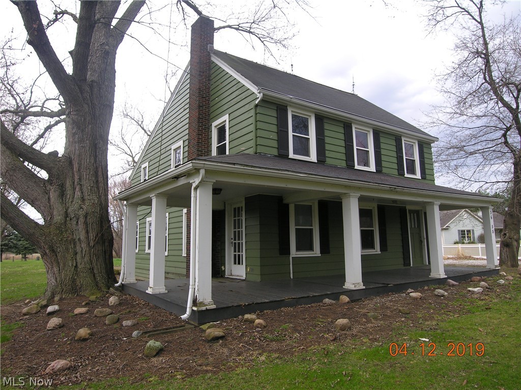 Enjoy 2 .5 acres in Eaton Township low taxes and  Midview Schools. This was a grand home with wrap around porch. Partial renovation midway. Buyer can come put their owns touches on this home with loads of character. 4 bdrms 2 1/5 baths. Kitchen has  a big open space to a family room that leads to a deck. Huge yard.  Two story detached  garage .  Property was built prior to 1978 and lead based paint may potentially exist. " This property may qualify for Seller Financing (Vendee)."