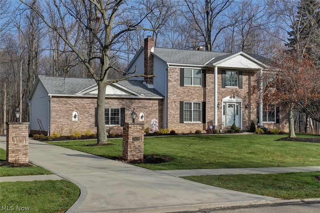 A must see colonial situated in the quiet neighborhood of Seneca Woods. This home has been meticulously maintained and updated throughout. Fantastic curb appeal offers new landscaping, stamped concrete walkway and a beautiful brick facade. Open two-story foyer with newly installed hardwood flooring throughout much of the main floor makes for a welcoming entrance. The floor plan is sure to please w/ a spacious formal living flowing into the elegant dining room. 1/2 bath on the main floor  The eat-in kitchen has been updated w/ granite countertops, mosaic tile backsplash and newer appliances. Located off the kitchen is a cozy family room w/ fireplace & wet bar. First floor laundry and access to the huge attached 3-car garage round out the first floor. The second floor features for 4 ample sized bedrooms with an in suite master bath and a full bath off the main hall. The lower level was finished in 2014 with a full bath, storage and nearly 1,000 sq ft of additional living space! Situated