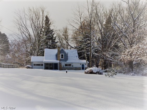 Huge 2 bedroom home in Coventry Township!  This charming Cape is tucked back on a nearly half acre lot.  The screened in front porch is the perfect place to relax & overlook the large yard.  Enter in to the main living room, currently used as an office.  This room could be used as a living room, office, formal dining room, or turned into a large first floor master bedroom.  Around the corner is big, open kitchen & dining area.  The kitchen offers TONS of cabinets & plenty of countertops, gas cook top, wall oven & tile backsplash.  There is also a reverse osmosis water filtration system at the kitchen sink. The refrigerator stays, microwave & dishwasher are negotiable.  The large family room has a wood burning fireplace, 2 sky lights, vaulted ceiling & sliders out to the patio.  Still on the main floor, there is a large mudroom, utility room & half bath with large vanity, lots of storage and fresh paint.  The freezer in mudroom is negotiable, washer, dryer & water softener will stay.  Y