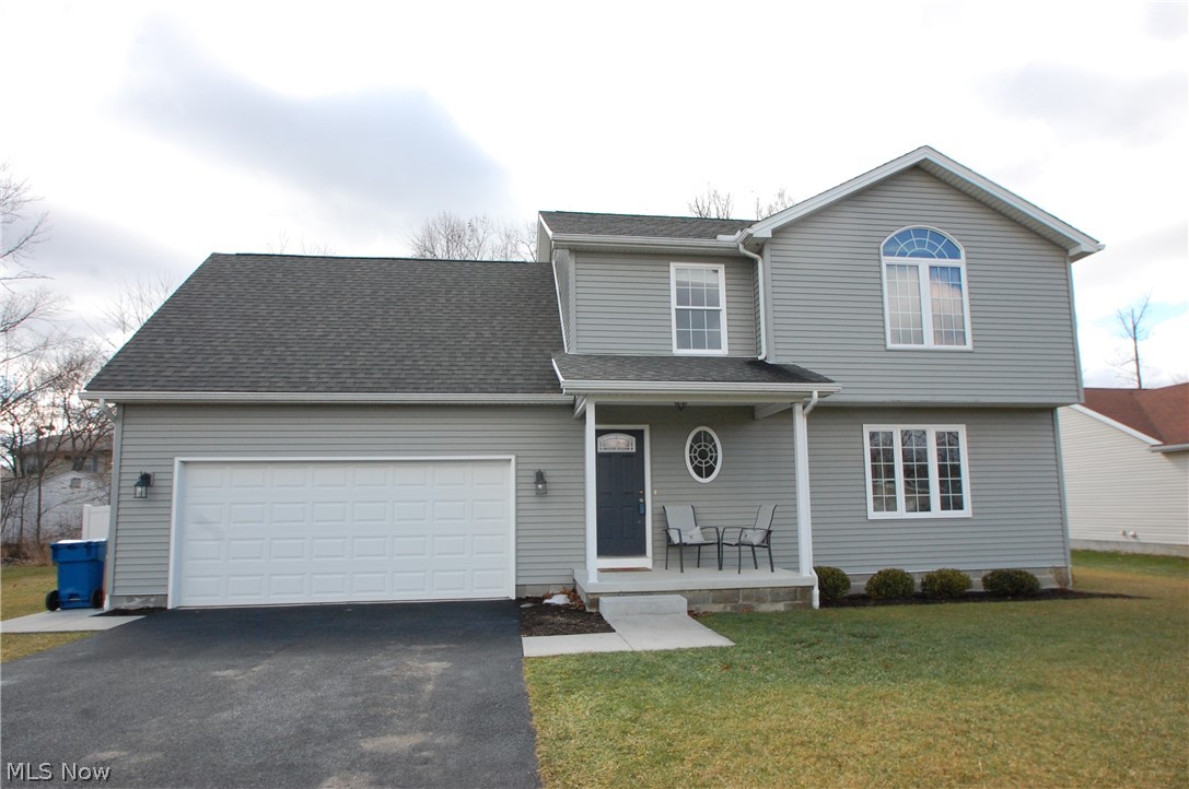 Updated vinyl 6 yr old 2 story boasting over 1800 Sq.ft. Features Great room w/ stone gas fireplace, eat in kitchen with new stainless steel appliances, updated hard surface countertops and subway tile backsplash. The dinette are has a slider out to a 24x18 stamped concrete patio and all vinyl fenced in back yard. There is a first floor laundry and a half bath rounding out the first floor. The second floor has a Master bedroom w/ full master bath and 2 walk in closets. There are 3 additional bedrooms and 1 full bath upstairs. The basement has a rec. room 24x18 all carpeted w/ drywall and drop ceiling. This home is move in ready and even includes a heated garage for a nice warm car to get into in the morning on those cold winter days.