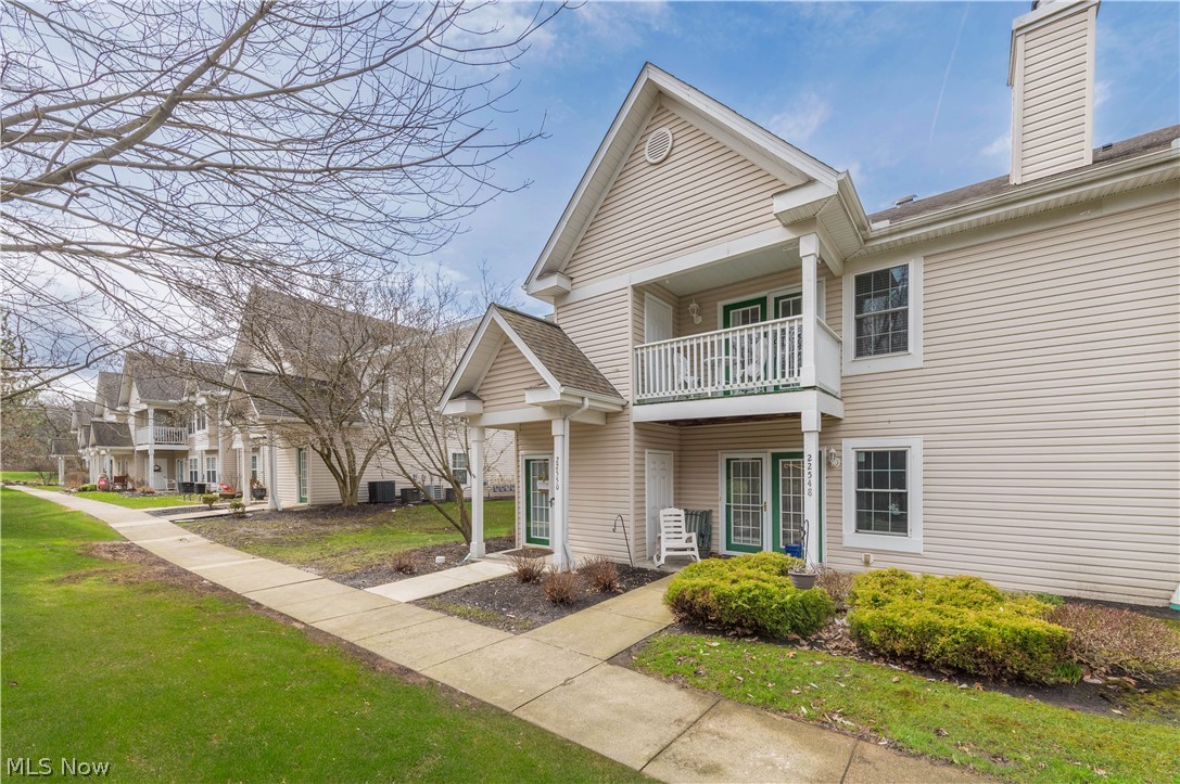 Enjoy serene, wooded views from your private second-floor balcony in this move-in-ready home. The interior boasts a spacious living room with vaulted ceilings and a cozy gas fireplace. Major updates within the last five years include a newer roof and windows, as well as a refreshed kitchen featuring a contemporary stove, microwave, and disposal. Additional recent upgrades include a new washing machine, three ceiling fans, and modern lighting throughout. Like new carpeting and a professional paint job, this unit feels brand new. Residents benefit from a detached garage with an automatic opener and a comprehensive HOA that covers water, sewer, trash, and all exterior maintenance.