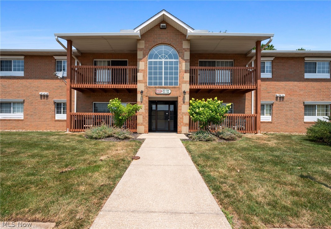 Move right in to this nicely updated, well maintained 2 bed 2 full bath 2nd floor end unit in Liberty Pointe Twinsburg. The great room features soaring vaulted ceilings, a cozy fireplace and plenty of natural light from the sliding doors to your private balcony overlooking mature trees. The new large plank LVP flooring flows seamlessly through the dining room & into the kitchen featuring ample solid wood cabinetry and comes complete with all appliances. The inunit laundry offers convenience, additional storage and both washer and dryer are included. Both bedrooms are generous sized, feature large closets & the master bedroom features a private ensuite full bath. There is an additional storage closet on the second floor for this unit. Ample parking spaces for 2 vehicles. Additional updates include hot water tank replaced (2024) bathroom vanity (2024) new 5” baseboard throughout the main living area with the new lvp flooring (2025) nest thermostat (2023). The Condo Assocciation takes care of water, sewer, snow and trash removal.  The Association has a waiting list for garage spaces & as they come available they are $40 per month.