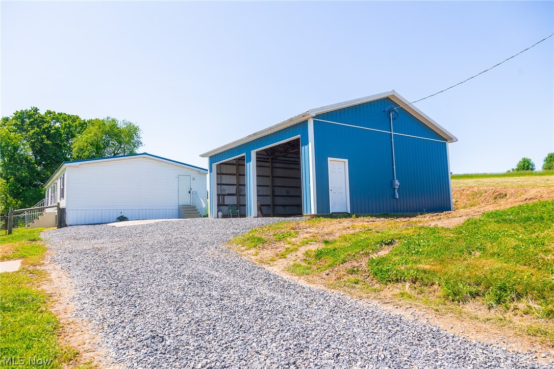 Parcel 1: This versatile 4-acre mini farm is ready for your country lifestyle. The property features a 3-bedroom, 2-bath mobile home with a large kitchen and dining area, along with a spacious living room perfect for family gatherings. Additional improvements include a 30x30 garage with electric service and a second fixer-upper home offering endless possibilities for renovation, rental income, or storage. A barn and fenced pasture are ready for your horses, livestock, or hobby farm animals, and there is plenty of room for a garden. Move right in and start enjoying this turnkey mini farm setup. 

Parcel 2: Offering over 31 acres, this parcel combines open, tillable ground with beautiful wooded acreage, creating the perfect balance for farming, recreation, and hunting. Two hunting blinds and food plots are already in place, making this an outstanding hunting retreat. With ample space to build a cabin, this property could easily become a private family getaway where you can enjoy the outdoors year-round. 

Buy One or Both! 

Purchase both parcels together and enjoy the best of rural living with room for farming, hunting, livestock, gardening, and outdoor recreation. This unique opportunity offers the space and versatility to create your dream homestead, hunting property, or family retreat.