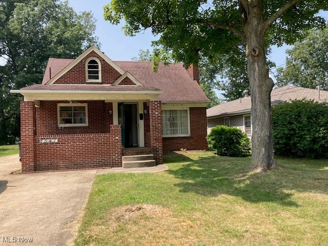 Brick Cape Cod with front porch. The home needs some fixing up but can be a real charmer. Good size kitchen. Full basement. Roof about 15 years old. 2 full baths -  one on main level, one up. Hardwood floors in the living & dining rooms. Fireplace is closed up for insurance purposes. Single car garage.