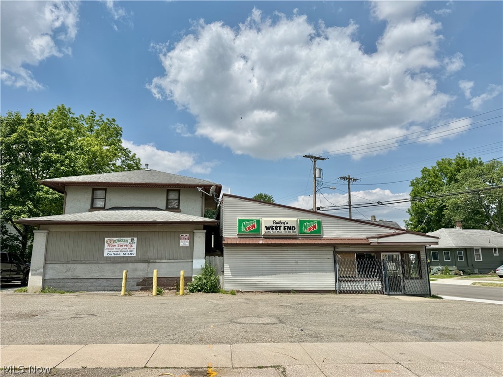 WELCOME INVESTORS, BUSINESS OWNERS, AND ENTREPRENEURS! Positioned in the heart of Massillon's established West End, this nearly 3,000-square-foot commercial building presents an outstanding opportunity for an owner-occupant, investor, or developer seeking a property with existing infrastructure and endless possibilities. Long recognized as the former Bailey's West End neighborhood market, the property has served the community for decades and is ready for its next chapter.

The commercial space features an open retail floor plan complemented by a front checkout/reception area, two commercial walk-in coolers, storage rooms, utility areas, and multiple workspaces that can be adapted to a variety of business models. Parking is available in both the front and rear of the building, providing convenient customer and employee access.

Connected to the commercial portion is a former single-family residence that requires significant renovation but offers tremendous value-add potential. Whether restored as residential living, office space, employee housing, additional storage, or incorporated into a larger redevelopment plan, the additional square footage creates opportunities that many comparable commercial properties simply cannot offer.

The property's flexible layout makes it well suited for a neighborhood market, convenience store, specialty food retailer, deli, butcher shop, carryout restaurant, bakery, office headquarters, medical or professional services, contractor operations, retail showroom, nonprofit organization, warehouse or distribution use, or a mixed-use investment, subject to applicable zoning and buyer verification.

With an established location, recognizable history, existing commercial improvements, and substantial upside through renovation or redevelopment, this property offers a rare opportunity to create value at an attainable price point.

Schedule your private showing today and explore the possibilities this West End landmark has to offer.