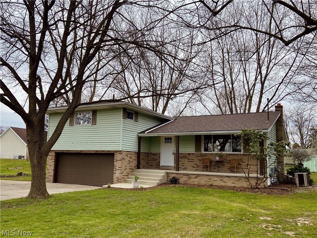 Stop searching for your next home because THIS IS IT! Its got everything you want - great location, Lakeview schools, large lot, tons of updates, spacious rooms, open design...the list goes on and on. The main level offers a terrific open floor plan with soaring ceilings, great room, dining area and a nicely-remodeled kitchen with island. The upstairs features a master bedroom with attached bath, plus two additional bedrooms and a full bath. The lower level has a family room with new electric fireplace and a half-bath. The basement provides lots of storage and a laundry area. Here's what's NEW: Roof, flooring, interior paint, kitchen, bathrooms, lighting fixtures and backyard fire pit. Other highlights include: Public utilities, central air, attached garage, patio and storage shed. All this in a quiet location just a few minutes from Mosquito Lake. What more could you ask for??