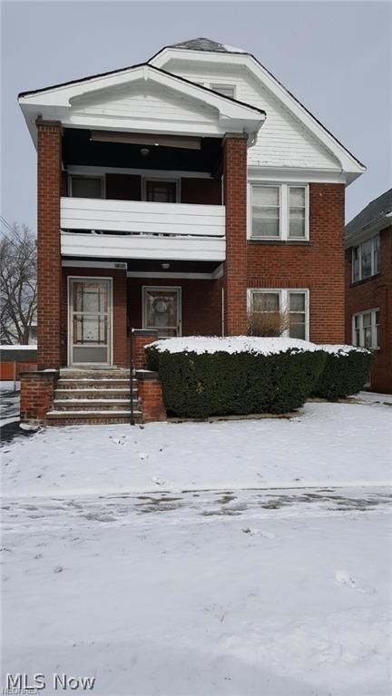 Well maintained brick double home. Wood floors, fireplace and nice porch. Detached garage and full basement.