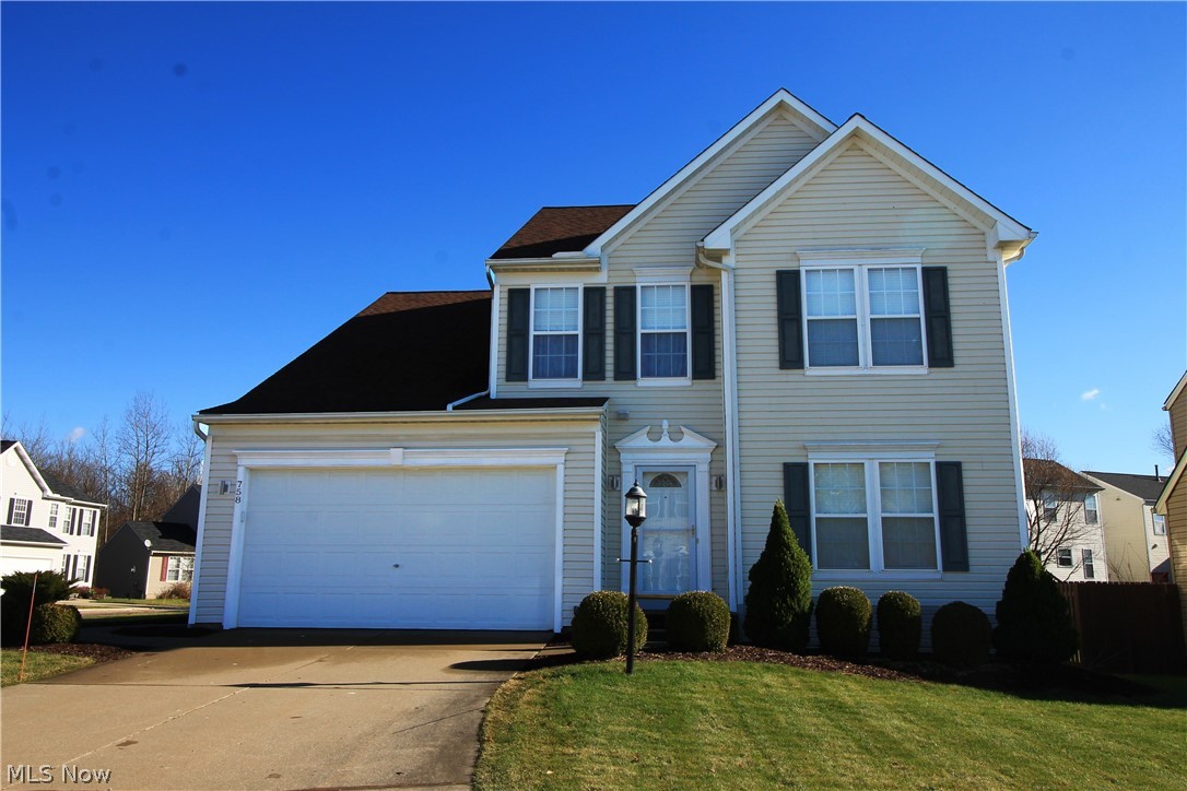 Wonderful Innsbruck Model, 4 Bed, 2.5 Bath Colonial on a premium corner lot. 9' Ceilings throughout 1st floor w/Formal Dining Room or Den, open floor plan w/accent wall to the great room & extra dinette area to the spacious kitchen featuring 42" custom cabs w/Silestone quartz c-tops & ceramic tiled floors. Convenient 1st floor laundry, newer ceiling fans & window treatments too.  2nd floor Owner's Suite spotlights a walk-in closet and glam bath w/private shower & jetted tub. 3 more spacious bedrooms and a hall bath complete the upper level. Unfinished basement, 2 car garage, back yard paver patio and priced to sell. Close to all major travel arteries w/lots of shopping and dining local. Cleveland, Youngstown or Akron in 30 minutes. Don't wait, call today.