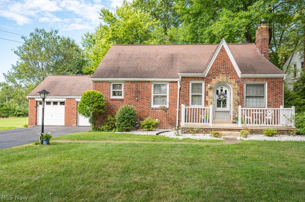 Come out to 975 Jennings Ave. to see what this home has to offer.  It has been meticulously taken care of and shows "Pride of Ownership" Home features 3 bedrooms & one bath. A spacious living room with FP has gas hook up (owners currently using electric logs).  kitchen, bath and 2 bedrooms on the 1st.  The second floor has a large bedroom with hardwood floors.  The owner thinks there is hardwood floors under the existing carpet in living room & bedroom like showing in the bedroom on 1st and 2nd floors. The LL is where the laundry is located and is a great open space.  The 2-car attached garage has storage room under has access door from the outside in the back of the garage which is great additional storage space.  Small storage shed to front of the property is another great place for storage. Columbia Gas is $86.00 per month, Ohio Edison is $40.00 per month.  Room sizes and sq. ft. is approx.  Call today to take a closer look at this charming home as you will not be disappointed.