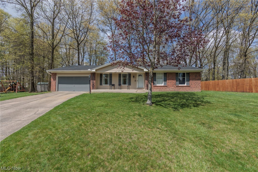 One floor living at it's best, this lovely Stow ranch has 3 bedrooms and 2 full bathrooms.  This large set up features a sunken family room with fireplace, large formal living and dining rooms, and an eat in kitchen.  The bedrooms are spacious, with the master being a suite. Natural wood floors run through the living room and bedrooms.  A partially finished basement, nice yard on a cul-de-sac, attached 2 car garage, porch, patio, and much more.