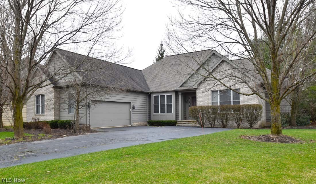 Beautiful  1st floor living at its finest. Located in the prestigious golf community of Barrington you will find this 2 BR, 3 1/2 BTH ranch, situated on a double lot.  From top to toe the main living space is a combination of beautiful hardwood floors, prestine white carpeting, vaulted/tray/2 story ceilings, walls of windows all lending to this open airy floor plan. The dining room flows into the living room that leads to the eat-in kitchen and family room. The gas fireplace and built-in bookcases are the perfect feature wall visible from the KT & FR. Large master suite with vaulted ceiling, built ins and sitting area where you can step out onto the deck and enjoy a bit fresh air overlooking the private backyard.  2nd BR includes adjoining FBTH.  Very large finished basement area, plumbed for a bar. Additional room with closet space and FBTH. Be sure to not overlook the tons of storage space in the other half of the BSMT. Glass block windows allow for great natural light. Hot water hea