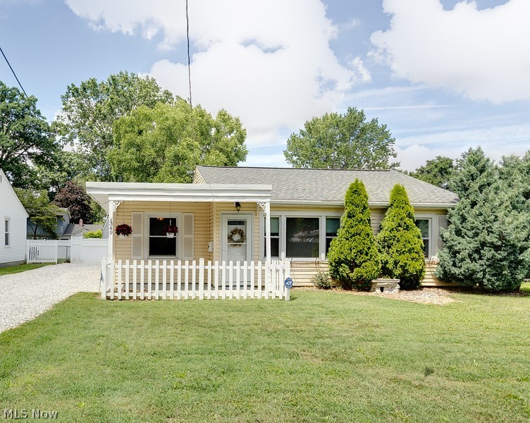 Step inside & immediately feel at home in this radiant, cottage-inspired ranch home nestled in a quaint & quiet community bordering Kenmore & Coventry. This charming, sunshine-filled 3-bedroom, 1-bath property offers a warm & welcoming atmosphere from the moment you enter.  It truly feels like your own cozy, suburban retreat.

Enjoy relaxing on the inviting front porch overlooking a beautifully landscaped, picket-fenced garden. The fenced-in backyard provides privacy & space for outdoor entertaining, pets, or kids at play & a large storage shed. Inside, you’ll find an updated bathroom, a fully equipped updated kitchen, & a convenient laundry room that comes equipped with a washer/dryer. 

A delightful property that blends timeless charm with everyday comfort, making it an excellent opportunity for first-time homebuyers, those looking to downsize, or anyone seeking low-maintenance living in a peaceful neighborhood with convenient access to an elementary down the road, shopping, dining, parks, and major highways. Coming nearby is a newly built Amazon facility bringing new job opportunities to the area. Schedule your showing today!