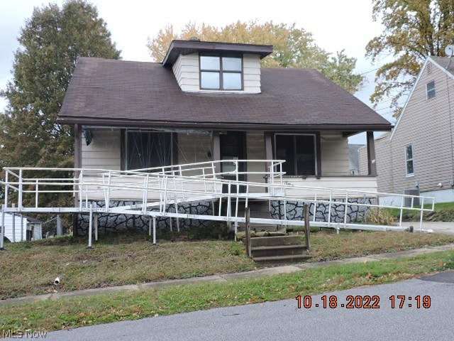 Let's see what you can do with this one!  Appealing one and a half story Barberton bungalow.  HUGE backyard.  HUGE 2 plus car block garage.  The first floor has a living room, dining room or THIRD BEDROOM, dine-in kitchen, bedroom. and the bathroom.  The 2nd floor is one big bedroom with lots of nooks and crannies.  Great looking neighborhood!