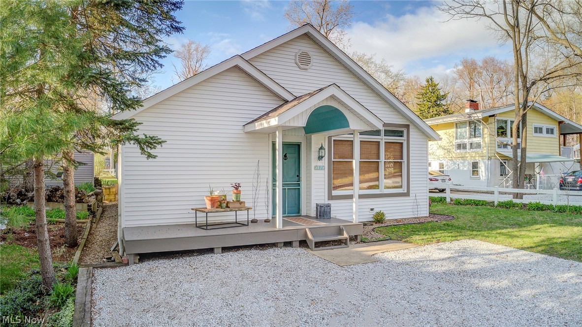 If you've always saw yourself as a Portage Laker, living life in a stylish home with lake privileges and views from the front and back, but also assumed the price meant it would never be more than a dream? Well wait till you see this little dream come true, with a price tag that doesn't feel like a nightmare! Completely renovated and well thought out, with tons of style, low maintenance, and convenience. Pretty much every space has been overhauled in the last few years and the entire house since it was purchased. Most recently the roof, gutters and guards, & skylight replaced in 2016, new A.C. unit in 2015,new furnace in 2019, water softener in 2016, sliding doors off of master in 2013, french drains added in 2016, kitchen completely remodeled, bath/ laundry room remodeled, huge 19x15 master bedroom added. 3rd bedroom is used as a closet, converts right back or the rods and storage shelves system in place can remain. The home offers a low maintenance lawn with a storage shed and cozy p