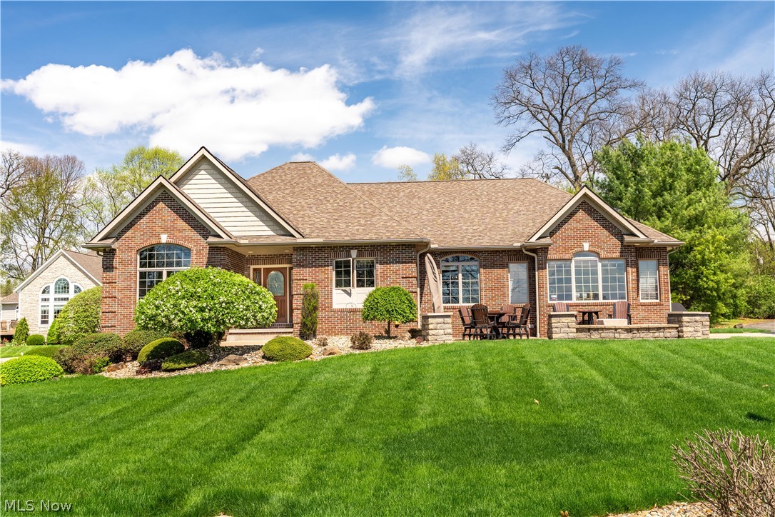 Welcome to this beautifully maintained home offering comfort, style, and stunning lake views. From the moment you step inside you’ll appreciate the open, inviting layout filled with natural light and scenic views that create a peaceful, relaxing atmosphere. The spacious living areas are perfect for both everyday living and entertaining, while the thoughtfully designed kitchen features ample custom Mullet cabinets, generous counter space and modern finishes.

The home offers comfortable bedrooms, including a relaxing primary suite where you can wake up to serene lake views along with two additional bedrooms. Quality flooring, abundant storage, and tasteful finishes throughout adds to the home appeal.

Step outside and enjoy easy access to the lake; perfect for Kayaking, paddle boarding, fishing or a peaceful boat ride. Whether sipping morning coffee or watching sunsets, the outside provides the perfect backdrop for lakeside living. This home offers the ideal balance of relaxation and convenience.

Lake access includes your very own dock and home is move in ready. This is a rare opportunity you won’t want to miss!!!

House Sq.Ft is 4462, 2231 main floor, 2231 unfinished lower level plumbing available for additional bath.
Lot size - 0.26 acres, 11,538 Sq.Ft, lot size 80 X 120
Home owners association- Lot 6 - dock number- $250./yr
Bedrooms: Three (master and two additional)
Bathrooms: Two full and one half
First floor laundry
Great room and Florida room filled with windows

Enhancements: within the last five years
Garage doors with openers
Grinder pump
50 gallon Hot Water tank
Granite counter tops, sink and back splash
Refrigerator, dish washer and cooktop
Bathroom solid surface counter tops and sinks
Custom vanity mirror frames in bathrooms
Great room LVT floor, Fireplace brick and mantel
Carpet in two bedrooms
American standard toilets replaced
Recessed lighting throughout including garage
Sump pump in basement
Roof and spouting replaced
