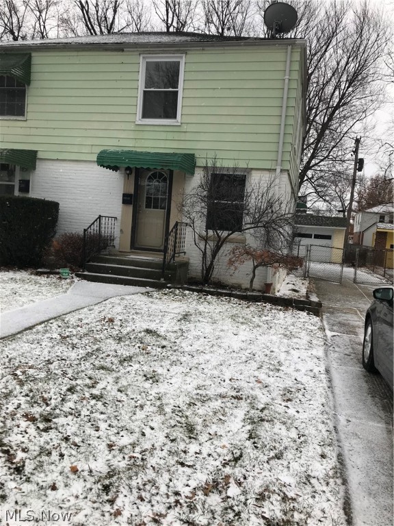 Beautifully renovated half duplex. This home has 2 bedrooms, one bathroom with a finished basement and lavatory located in the basement. Central air, enclosed porch and fenced back yard. This home is priced to sell. Schedule your showing today. Immediate possession available. Owner is a licensed real estate agent.