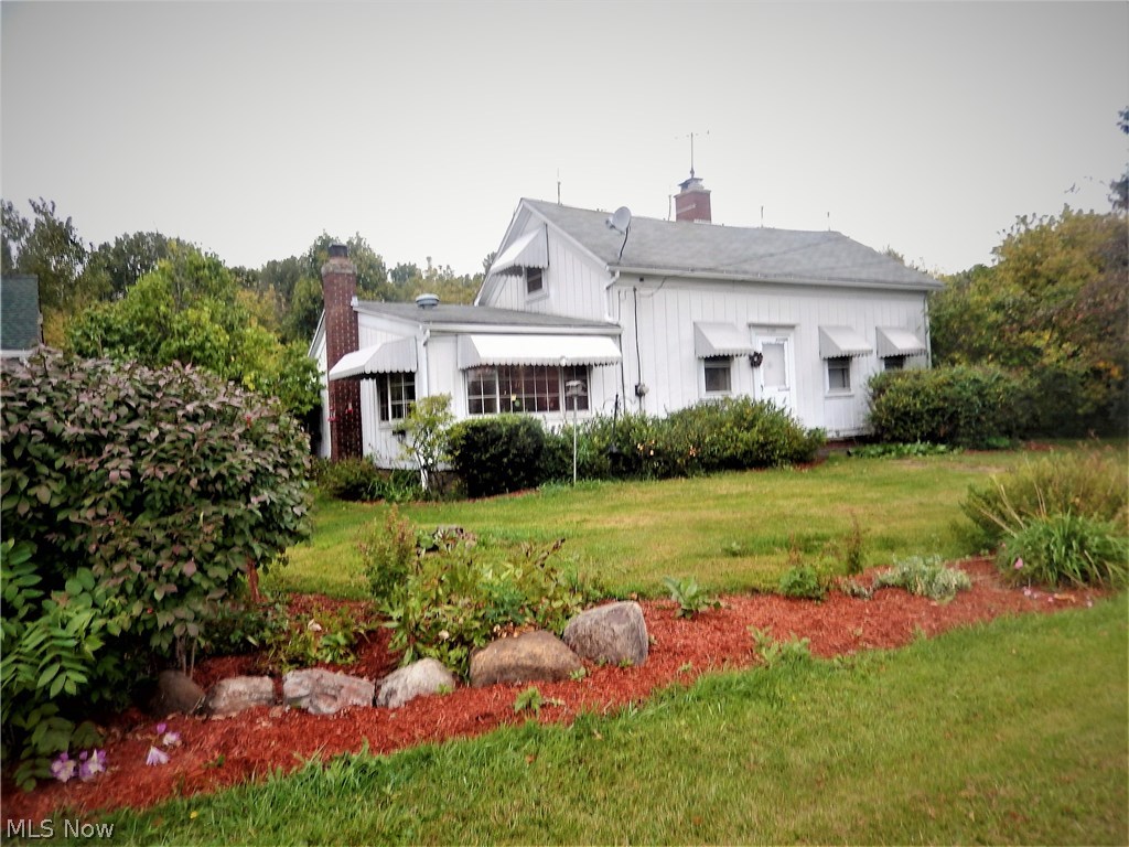 Unique Century Home nestled into a scenic wooded/ravine 2.83 acres + 2.32 separate parcel! This well maintained Cape Cod style Century home was built in 1880 with 4 Bed/2.5 Bath. This home is located in a desirable country area with recent home builds. This home features 2 wood burning fireplaces, a solarium style dining room, and covered porch with basement access. Barn Style detached 30 X 20 three car garage with large storage loft! Two 20x12 storage sheds, white shed has a horse stall/loft/new roof, standard red/wood shed formerly used as a chicken coop. Furnace 5 years old, new hot water tank/floater added in 2015, 10 year old roof, all appliances included. One year home warranty for added peace of mind! Call today to schedule your private showing!