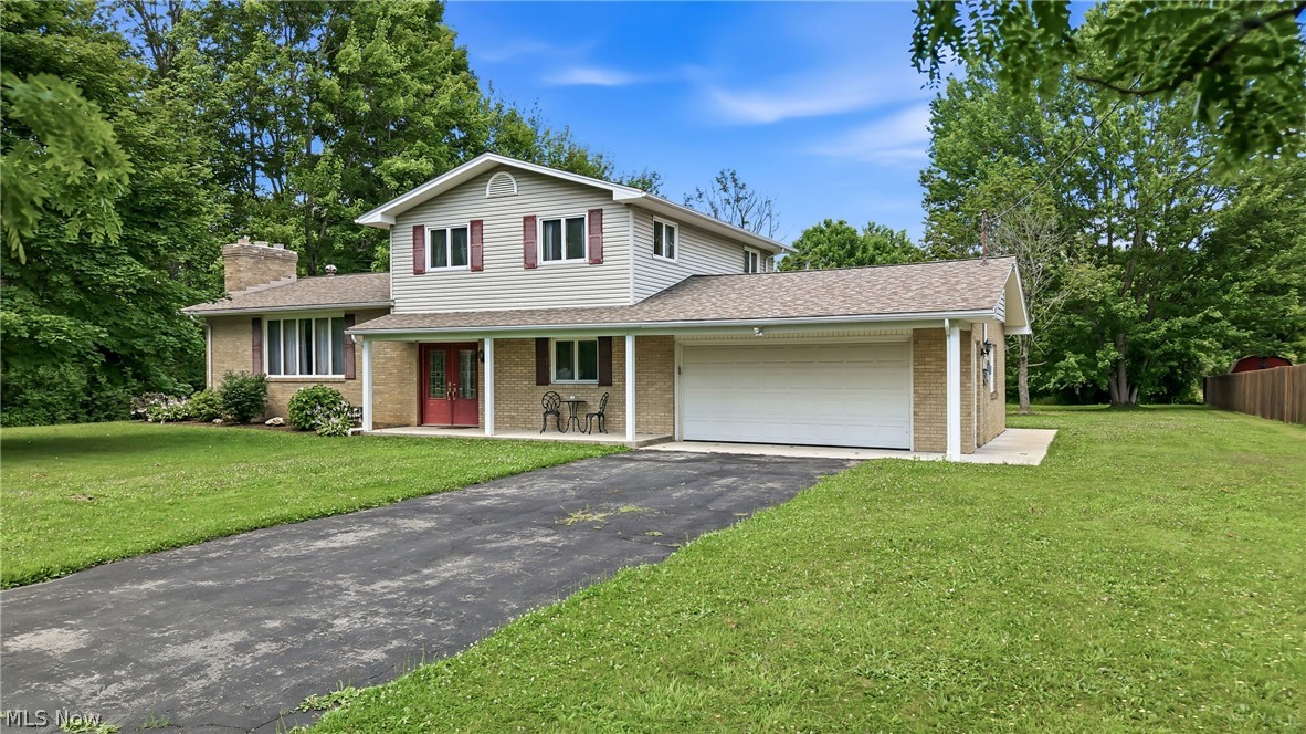 Welcome home to this spacious split-entry home nestled on a quiet cul-de-sac! Offering 4 bedrooms and 3 full bathrooms, this three-level home provides a flexible floor plan with plenty of space for everyday living and entertaining. One of the four bedrooms is conveniently located on the main level, making it ideal for guests, a home office, or multigenerational living. The bright living room features a cozy fireplace, while the lower level offers an additional living space with a second fireplace perfect for a family room, recreation room, or relaxing retreat. Step outside to enjoy the exceptionally large, private backyard complete with a patio and an invisible fence surrounding the property, providing added convenience for pet owners. A 2-car attached garage completes this wonderful home. Don't miss your opportunity to make it yours!
