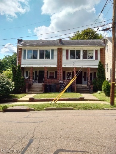 Originally constructed for Goodyear Tire executives in 1918, this all-brick eight-bedroom duplex presents an opportunity for generating passive income. Each unit comprises four bedrooms, a single bathroom, a spacious living room, a dining room, a large kitchen, front and rear porches, and their own basements. This duplex is offered for sale as is. The roof is approximately three years old, while the furnace and air conditioner are both ten years old. 1244 is occupied.  Do not bother tenant.