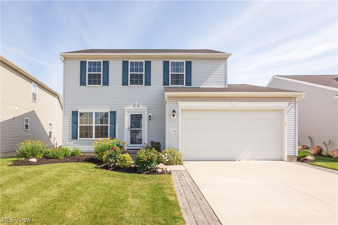Welcome to the desirable Meadow Lakes Community in North Ridgeville! The newly built (2017) and extremely well maintained colonial Concord model home boasts 3 beds, 2.5 baths and 1664 sf of living space. FANTASTIC curb appeal with lush and professional landscaping w/ extra wide driveway! Upon entering the home, you're warmly greeted by the flex room that can be used as a formal living/dining, office or kids play room. The kitchen offers upgraded flooring, countertops, cabinets, light fixtures w/ dimmers and features kitchen island and beautiful stainless steel appliances w/ an eat-in kitchen space that overlooks the spacious 16X15 family room. Off the kitchen are sliders leading to your massive 625 sf paver patio w/ built in fireplace where you can enjoy your backyard and is perfect for entertaining. The grand master bedroom suite offers ensuite bathroom w/ dual sinks and glass walk in shower and walk-in closet. The additional 2 bedrooms are generously sized and offer ample closet spac