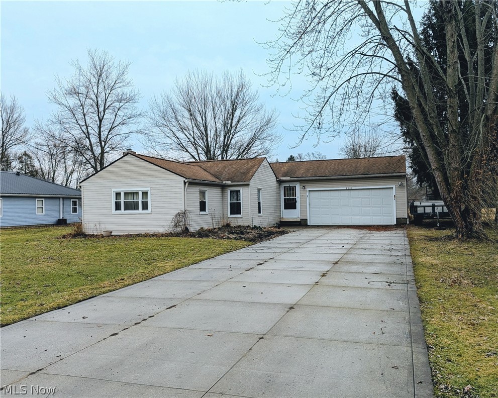This fixer-upper or investment property in Green is just waiting for your creativity to make it shine. 2000 Stake Drive features 4 bedrooms, 2 full bathrooms, basement and walk-up attic, all on a half-acre lot with a deck. All appliances are included. Now is your chance to "Stake" your claim on a home within the City of Green and Green Local Schools, situated on a quiet side street and conveniently located near a post office and the quaint local businesses of historic Greentown. Bring your ideas and offers!