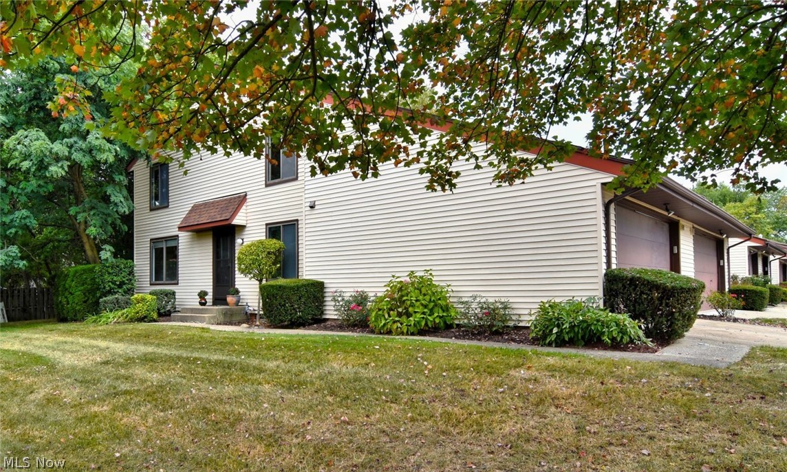 highly sought-after 3-bedroom, 2 full baths, and 2 half baths end unit in Liberty Hills. Beautifully updated throughout.  New carpeting has been installed on the main level and the basement recreation room. Large family room features a classic brick fireplace with a wood-burning insert. Glass patio sliders lead to a private concrete patio surrounded by trees. The semi-formal dining room, with chair rail and crown molding, opens to the beautifully remodeled kitchen, featuring new luxury vinyl flooring, granite counters, and backsplash.  All appliances are included. Upstairs, you'll find three large bedrooms, including the spacious primary suite with a private deck, walk-in closet, and an ensuite full bath. The second full bath is also upstairs. The full basement is half-finished, with new paint and carpeting, recessed lights, and a half bath. The two-car attached garage features durable, premium $5,000 epoxy flooring. The seller has generously offered a 1-year home warranty for the buyer. This property is close to schools, shopping, and the highway. Solon has been considered a top school district in the state for years. This is easy to show and available immediately. Call today to schedule a showing!