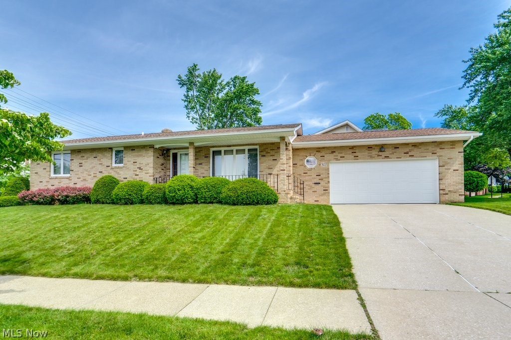 Welcome to this spotless all-brick ranch full of character and charm! This very clean, well-maintained home features 2 spacious bedrooms, each with 2 closets. One bedroom includes its own full bathroom with a brand-new faucet, plus there is an additional full bathroom off the hallway. The home offers 2 comfortable living areas with brand-new carpet. The living room off the updated open kitchen features an electric fireplace that also has the option to be converted to gas. The kitchen includes a dishwasher, stove, and refrigerator, all new in 2026. The full basement is pristine and partially finished, offering great additional space and a gorgeous fully updated full bathroom. Additional highlights include an oversized attached 2-car garage, updated outlets throughout, added attic insulation, and the option for ALL furniture to stay!!