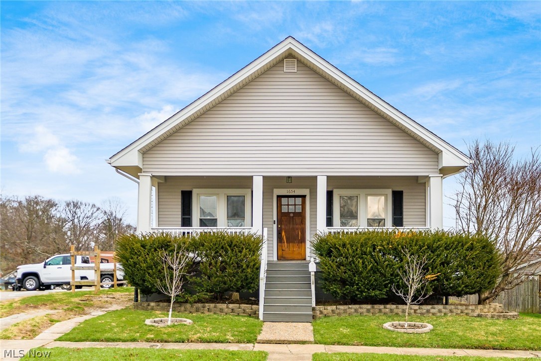 This charming 3 bedrooms/1 bathroom house on the north end of Zanesville has so many updates. Very spacious living and dining rooms with hardwood floors.The kitchen has stainless appliances and an island for extra space. Two bedrooms and a full bathroom complete the first level.The upper level offers a bedroom and loads of storage. The partially finished walk out basement has new windows and a great deal of space. Off of the kitchen you have a covered porch and huge deck for entertaining. The sellers have left wood to complete the fencing of the backyard.The roof,windows and the vinyl siding have been updated.