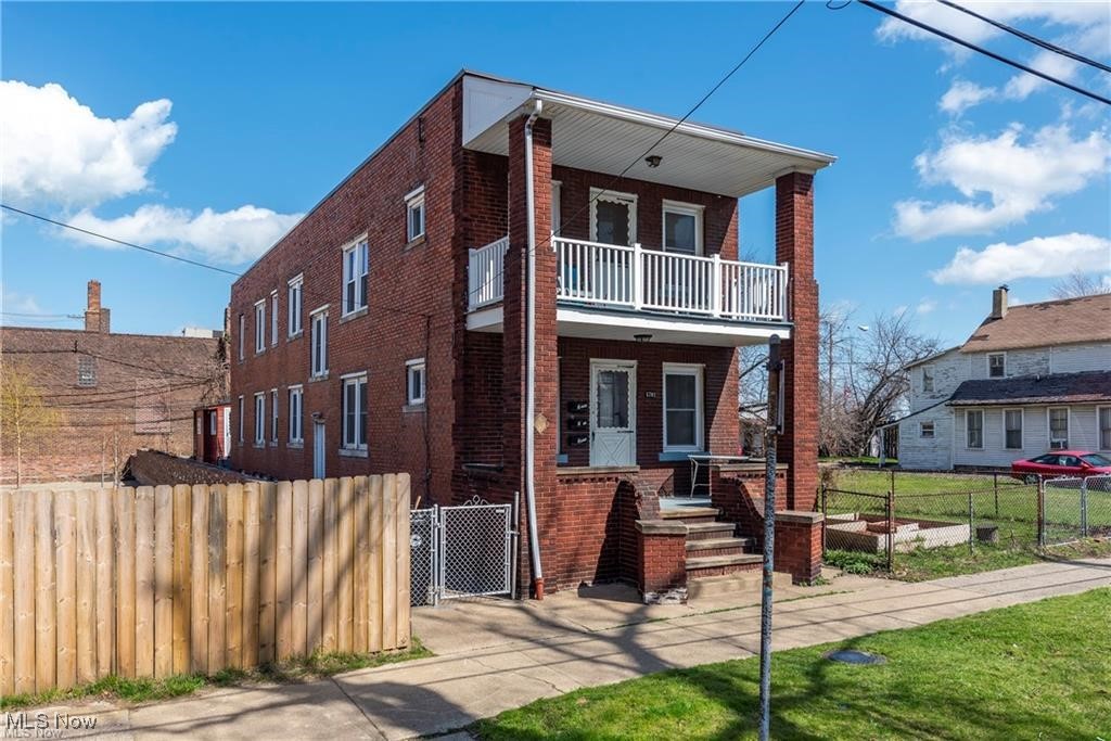 Modern luxury meets historic charm in this beautifully renovated ground-floor residence in Cleveland’s sought-after Detroit Shoreway neighborhood. Perfectly located at Herman Avenue and West 58th, you’ll be just steps from the Lakefront bike path and a short walk to Edgewater Beach and Gordon Square’s shops, cafes, and restaurants.

This spacious 2-bedroom, 1-bath home offers 1,368 square feet of living space, a covered front porch, and a rare 3,300-square-foot fenced-in side yard — perfect for outdoor relaxation or entertaining. Fully updated in 2022, the home features a stunning modern kitchen with quartz countertops, stainless steel appliances, custom Shaker cabinetry, and a cozy built-in breakfast nook with storage. Original 100-year-old oak hardwood floors run throughout, blending historic beauty with modern convenience.

The luxurious bathroom includes marble tile, black fixtures, a floating vanity, and an accordion glass shower door. Enjoy the convenience of in-unit laundry with a 2022 Samsung high-efficiency washer and dryer, plus smart home upgrades like a keyless entry lock and Ecobee smart thermostat.

Additional perks include off-street parking, basement storage, and all landscaping and snow/ice removal included in the rent. This move-in-ready home offers modern comfort, low-maintenance living, and timeless character in one of Cleveland’s most desirable neighborhoods.