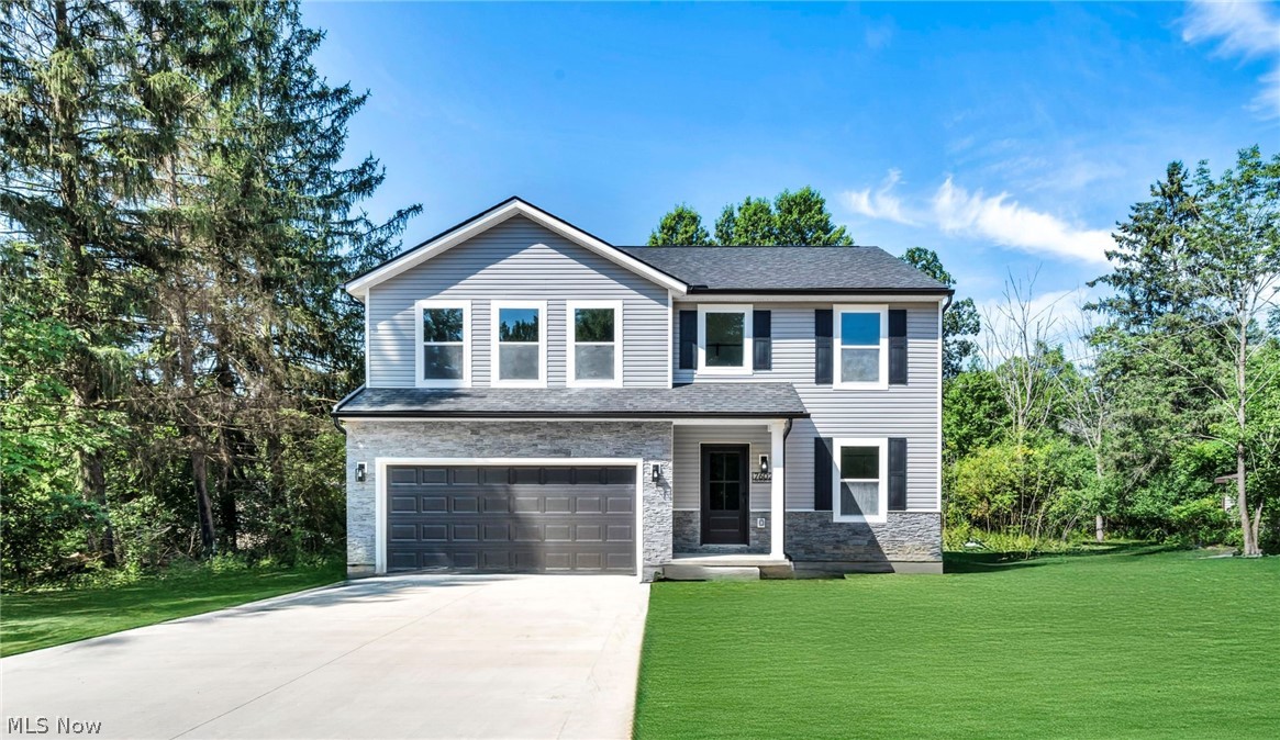 Welcome to this stunning new construction home in Oakwood Village offering 5 bedrooms, 3 full bathrooms, and over 2,200sq ft of modern living space on nearly half an acre. As you enter you?re greeted by a striking accent wall and custom handrails with luxury vinyl flooring throughout the home. The main floor features an open layout with a bedroom or office and a full bathroom with custom tile and gold fixtures. The spacious kitchen flows seamlessly into the dining and living areas and is equipped with wood soft close cabinets, quartz countertops, custom backsplash, and brand new Whirlpool stainless steel appliances. The cozy living room includes an electric fireplace with a modern accent wall. Upstairs you?ll find four additional bedrooms and two full bathrooms, including a luxurious primary suite with an electric fireplace, two walk in closets, a freestanding tub, glass enclosed shower with custom tile and gold accents, and a double vanity. A statement chandelier and custom stair railings add a touch of elegance. Sliding glass doors lead to a wood porch with the potential to expand into a full deck overlooking a spacious backyard perfect for entertaining. This home also features an attached two car garage and is conveniently located near shopping, freeways, and parks. Don?t miss your chance to own this beautifully designed move in ready home in one of Oakwood Village?s most desirable areas! This home comes with a one year builders warranty and a home warranty for extra peace of mind for the buyer.