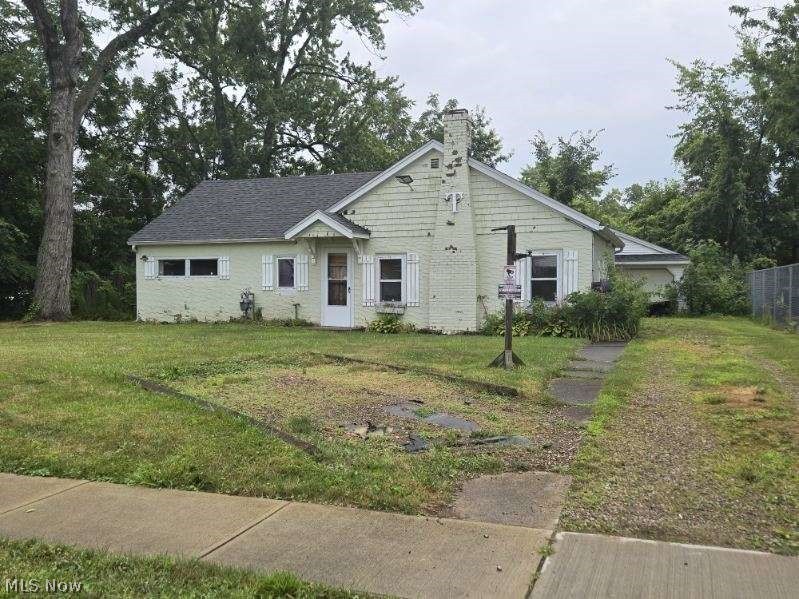 This 2 bedroom 1 bath home is your next rehab project! Located in an area of well cared for homes. Roof was new approximately 3 years ago. Natural gas heat and a fireplace in the living room. 2 car detached garage with a workshop area. East access to highways, schools and shopping. Immediate possession!