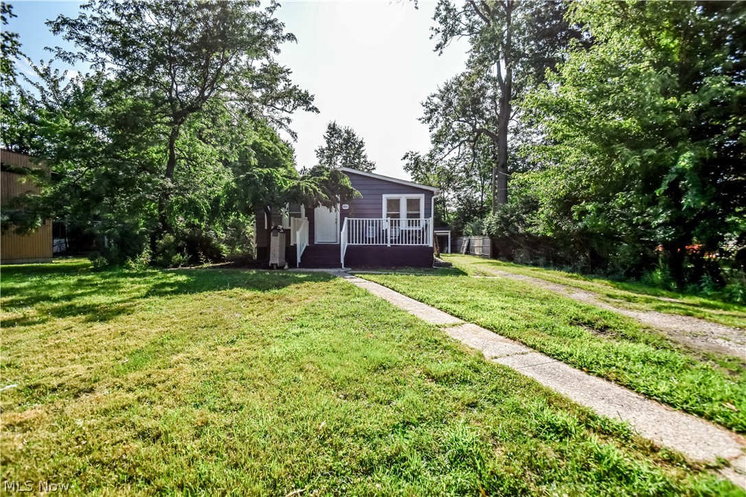 Welcome home to this charming 3-bedroom, 1-bath ranch nestled on a quiet street and set far back from the road, offering both privacy and convenience. Ideally located near shopping, dining, and entertainment, this home combines peaceful living with easy access to everyday amenities.
Step inside to find natural hardwood floors flowing throughout the home, and under the current flooring, creating a warm and seamless transition between each living space. The spacious primary bedroom offers more room than most, providing the perfect retreat at the end of the day. Outside, enjoy the expansive backyard and added back patio-ideal for entertaining, relaxing, or enjoying summer evenings.
Recent updates include freshly painted siding (2026) and a new roof (2023), offering added peace of mind for years to come. The full basement presents endless possibilities with ample space to create a recreation room, home gym, additional living area, or simply enjoy abundant storage. Don't miss your opportunity to make this well-maintained home your own!