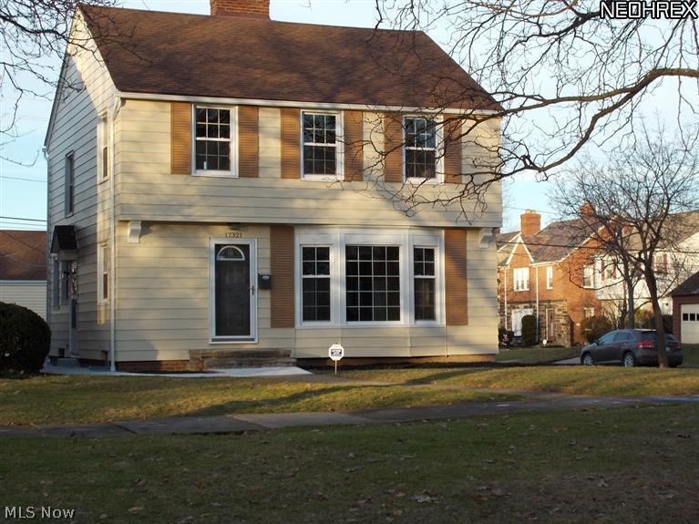 Stunning Renovation !!!! This Shaker home was renovated by one of the cities select investors. This home boasts all neutral designer paint colors. All ceilings are smooth, no texture, & walls are professionally finished & look like new drywall. The living room has custom recessed lighting & a beautiful fireplace, with amazing reconditioned hardwood floors. The home has all new energy efficient vinyl windows, & all doors are newly installed. The kitchen has granite counter tops, custom wood cabinetry, porcelain tile floors, & all new whirlpool stainless steel appliances. This beautiful open floor plan has the kitchen that opens to the dining room, & from the dining room you have access to a beautiful tiled sun porch. The first & second floor bathrooms have been remodeled with beautiful porcelain tile floors & walls, & stunning bronze fixtures. The basement is a entertainers dream with rare 8ft ceilings, 2 new flat screen LED TV's, recessed lighting, fireplace, & custom wet bar w/granite