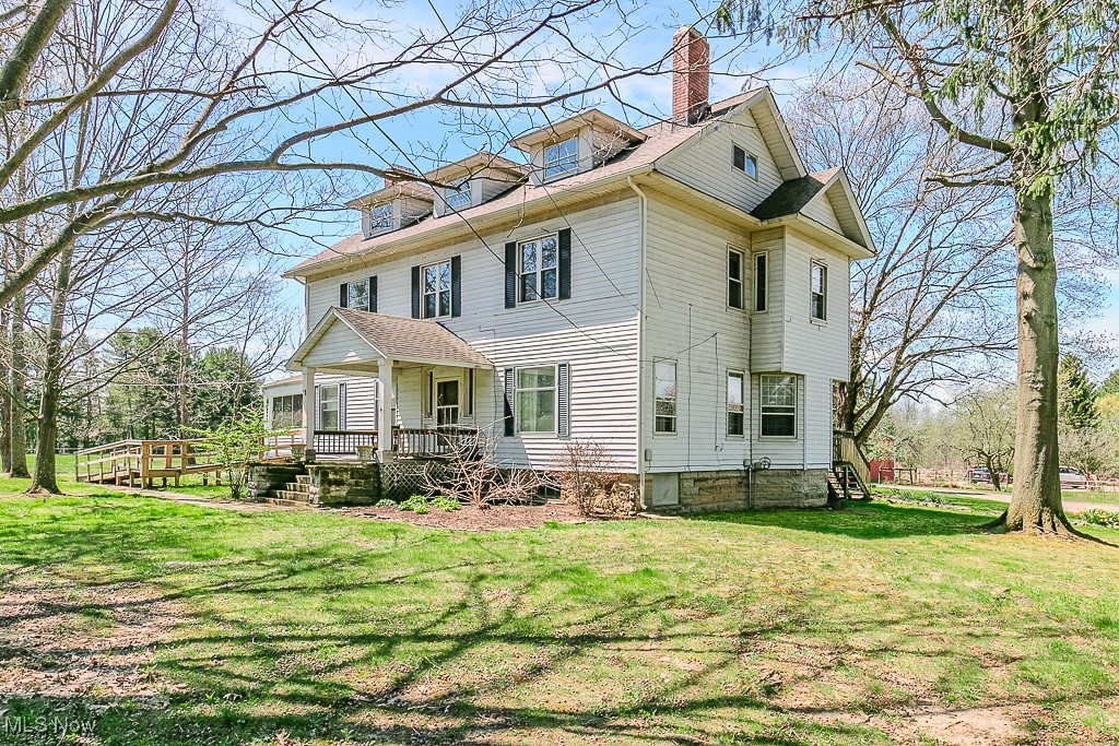 Rare owner/investor opportunity in Western Geauga County.  Century farmhouse is a 4-suite apartment building. 60'x120'  indoor riding arena w/20 stalls. Bank barn w/ 12 lower level stalls and upper level hay/machinery storage along with a separate 32'x40' workshop on 9.5 acres.  Great income potential from boarding/training horses and rental income from the apartments. Approx. 1.5 acres of open land for grazing/pasture. Come with your vision to bring the property back to it's full potential. 2 apartment suites are fully renovated.