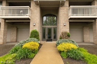 Welcome to 3800 Rosemont Blvd #103H in desirable Fairlawn! This third-floor condo offers an open, airy layout with vaulted ceilings and hardwood floors throughout. The unit features 2 bedrooms and 2 full baths, including a spacious primary suite with a large closet and updated private bath with dual sinks and separate shower. The second bedroom is generously sized with convenient access to a full hall bath. The main living area includes a bright living room with access to a private balcony overlooking luscious greenery, balcony is perfect for relaxing or entertaining, and an eat-in kitchen with quartz countertops, breakfast bar, stainless steel appliances, and ample cabinetry. Enjoy low-maintenance living with association benefits including WiFi/internet, cable, water, trash, and snow removal. Community amenities include a clubhouse with fitness room, sauna, gathering space, patio, BBQ area, and fire pit. Conveniently located near shopping, dining, and major highways. Home features brand new hot water tank.