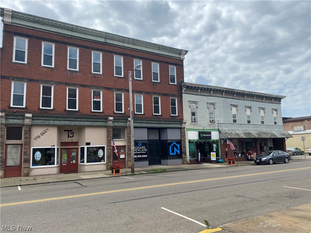 Large multi use commercial building. Lots of potential.