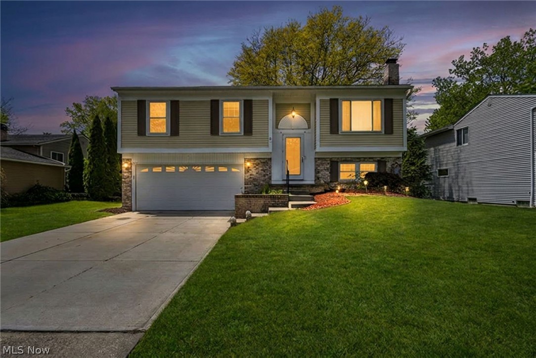 (4K Video Available) Beautiful brick & vinyl split-level/bi-level home situated on over third of an acre in the highly sought-after Brentwood Estates community plus ready for immediate occupancy! Owner transfer creates a fantastic opportunity to make this exceptional property your next home. Enjoy a deep fully fenced backyard w/relaxing covered patio, low-maintenance raised deck & plenty of room for entertaining or play. Spacious home offers 3 bedrooms, 2 full full baths. Versatile bonus room off the lower-level family room, ideal office/media room or studio w/direct access to the covered patio/backyard. Cozy family room features a romantic full-wall raised hearth brick fireplace plus an additional full bath for convenience. Remodeled kitchen boasts an open-concept design w/walls removed to create a bright gathering space. Appliances are included, dinette provides direct access to the raised deck overlooking backyard. Light-filled rooms create a warm space. Owner’s suite features attractive LVP flooring, large closets (excellent storage throughout), Lower private laundry room adds convenience. Updates include Andersen windows, newer mirrored closet doors, insulated garage door, repointed/capped chimney, newer hot water tank, updated LVT flooring, alarm system, upgraded 5G service. Oversized deep 2-car garage plus a large Amish-built shed provide exceptional storage. Located in desirable Olmsted Township with top-rated schools and possible RITA tax savings. See this Olmsted Township beauty before it’s gone!