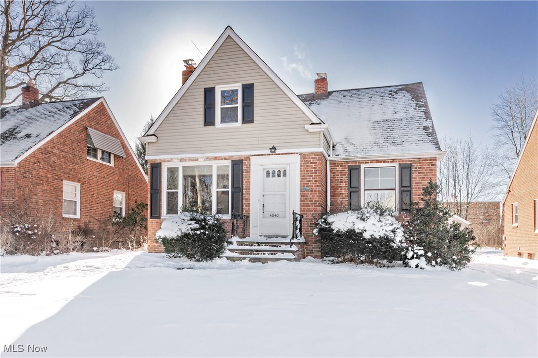 Tucked away on a quiet Cleveland Heights street, this classic brick bungalow offers timeless charm and a thoughtful layout. Two comfortable bedrooms and a full bath are located on the main level, while the upstairs owner’s suite provides a private retreat complete with a second full bath, an additional bedroom, and a generously sized closet. Original hardwood floors bring warmth and character throughout the home, and the inviting living room is anchored by a fireplace perfect for cozy evenings. Downstairs, a second fireplace sets the stage for finishing the basement into a family room, den, or recreation space. An enclosed back porch overlooks the yard and leads to a two-car garage, creating a seamless connection between indoor and outdoor living. A truly charming home in a desirable location—well worth a visit. All information provided is deemed accurate but not guaranteed. Buyer to complete due diligence.
