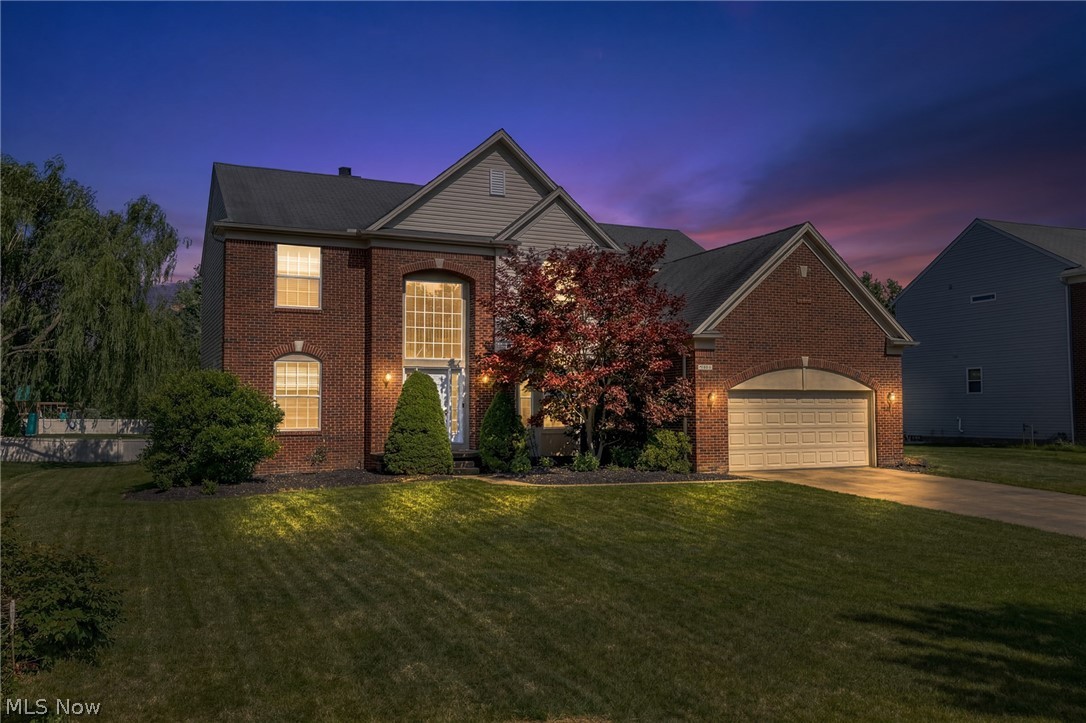 This 4,445 sqft, 4 bed, 2.5 bath New Hampton colonial boasts the ideal combination of comfort for everyday living, entertaining, and working from home. Offering oversized rooms and nearly every living space you could desire--formal dining, flex room, great room, 4-season, office, finished basement! Attractively priced to accommodate your desired updates. This home opens to an impressive 2-story foyer with a turned staircase and 3/4" tongue-and-groove solid hardwood flooring that extends through much of the first floor. Formal dining celebrations are elevated by crown moulding, a bay window, and serving station. The oversized flex room offers versatility for daily life or entertaining. French doors open to your fireplaced office, a refined space for professional pursuits. Enjoy family time in the great room, enriched by fireplace warmth and ambiance. The kitchen features granite counters, a center island, pullouts, a pantry, and dinette area. It transitions into an east-facing light-filled morning room with three walls of glass and a cathedral ceiling--equally suited for expanded dining or a 4-season room--and accesses your custom paver patio for alfresco dining/relaxation. Upstairs, your owner's suite boasts an oversized bedroom/ensuite--cathedral ceilings in both--with dual sinks, a makeup station, soaking tub, walk-in shower, and large WIC. A large dual-sink bathroom serves the other three bedrooms. Your 1,010 sqft rec room offers endless possibilities, equipped with a gas line for a fireplace, rough-in plumbing for a full bath, and three storage areas. This family-friendly amenity-rich community has a swimming pool, playground, paved trails and a clubhouse--all less than an 8-min walk! Walk to Michael Angelo's Winery. Nearby grocers and restaurants. Abundant recreation: Rec Center, Richfield Heritage Preserve, Metroparks and Cuyahoga Valley National Park are =12 min. Easy commute to Cleveland and Akron. I-77 & I-80 are 6-9 min. Comfort, lifestyle and location!