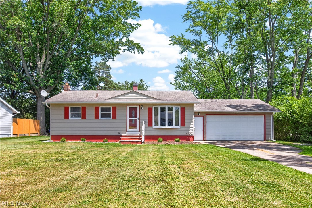 Nestled on just under half an acre, this well-maintained 3-bedroom ranch offers the perfect combination of comfortable living, a spacious backyard, and a convenient location close to shopping, restaurants, parks, trails, and major highways. One of the standout features of this home is the expansive backyard—offering plenty of room to play, garden, entertain, or simply relax while enjoying the peaceful setting and frequent visits from local wildlife.

Inside, the bright living room welcomes you with a large picture window that fills the space with natural light and a charming brick accent wall. The adjoining eat-in kitchen features fresh paint, a pantry, a newer stove (2024), and refrigerator (2026), making it ready for everyday living from day one. Step directly from the kitchen onto the spacious deck, creating an easy flow for outdoor dining, summer gatherings, or a quiet morning with coffee overlooking the backyard.

The main floor offers a functional layout with three bedrooms and a full bath. The third bedroom, currently used as a home office, provides flexible space to fit a variety of needs. Downstairs, the finished recreation room expands your living space and is ideal for movie nights, hobbies, a playroom, workout area, or game room. You'll also find abundant storage, a dedicated laundry area, updated basement electrical, and updated interior plumbing lines.

A 2-car attached garage, patio, generous lot, and thoughtful updates complete the package. If you've been searching for a move-in ready ranch with a fantastic backyard and convenient location, this is one you won't want to miss. Schedule your private showing today!