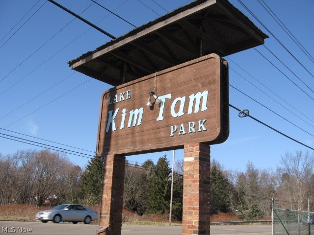 Take a look at his opportunity to own "Lake Kim Tam"! A swimming park that is well known in the area. It was originally established in 1960. 2 1/2 acre spring fed man-made lake features diving dock, children's swimming area & sandy beaches. Tennis courts, horse shoes, volley ball & baseball to add to the enjoyment & income. A great place to have family reunions, company picnics, special parties, group outings & much more. There are many picnic tables scattered thur out the grounds. Three excellent pavilions facilities to rent. Largest pavilion for 300 + people includes partial kitchen, walk in cooler, serving bar & restrooms. There is a large multi purpose building with locker rooms, showers, food concession & 2 apartments upstairs. Large parking lot, extra building with 3 garages & possible ice cream or frozen custard stand. Need someone who is wiling to bring this gorgeous setting back to its original glory!! Call for a private showing!
NOTE: There are 3 parcels totaling 13.57 acres