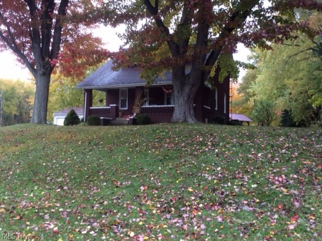 Solid brick 2 story home on a 3 acre wooded lot in a beautiful country setting. This home has been well maintained and is move in ready. Equipped with a modern eat in kitchen with newer counter top and  sink  faucet. Spacious living room with formal dinning room. Upstairs features three bedrooms with nice size full bathroom. Many updates include newer Windows throughout. Newer Lennox high efficient furnace with central air, updated electric box & wiring. New 40 gallon hot water heater. Newer soft water system with new pressure tank in 2015. Updated copper plumbing. Outside features 2 large garage buildings for your vehicles and outdoor storage items. The gorgeous wooded lot adds to the charm of the peaceful country setting. Caution: Be aware of the beautiful deer and color wild turkey crossing through the backyard of the property! A Home Warranty is provided as well!