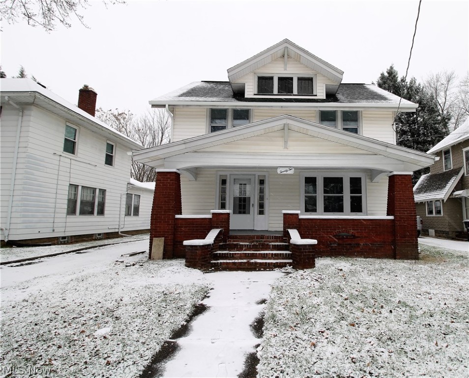 Welcome to this stunning, totally remodeled 3-4 bedroom, two full bath colonial home! Come on in from the covered front porch where you can relax and enjoy, to the huge great room, shiplap refinished fireplace, built in cabinets, large windows to enjoy the natural light shining through and open to the gorgeous dining room. The home has all new flooring and new windows, has been freshly painted from top to bottom. The bright and fabulous new kitchen offers recessed lights, abundant of new cabinets and counters, hardware, stainless steel appliances, stove with hood. Just gorgeous! Completing the first floor there is a remodeled laundry room, and a full bathroom with new tiled shower and toilet, new vanity and fixtures. Upstairs you will find three large bedrooms with walk in closets and new carpet. There is a large redone full bathroom with tile shower and sitting bench.  The third level is possibly a fourth bedroom, office, rec room etc. all totally redone. WOW! The lower level offers a