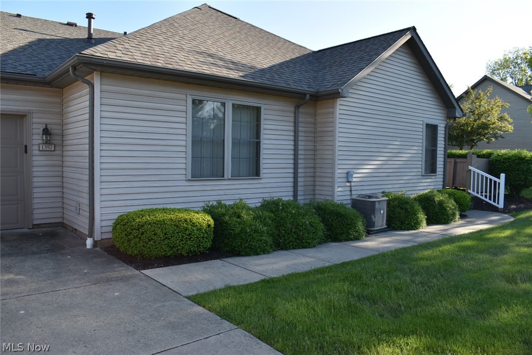 Beautiful ranch condo in the Villas at Springtree East with bonus loft area. One floor living at its finest! Walking up to this condo you will be greeted by a 12 x 8 patio with privacy fence, perfect for relaxing or dining outdoors this summer. Inside there are two bedrooms down the hall and two full baths. The master has an attached master bath and walk in closet.  In the living room you will find an open concept into the dining room and kitchen, perfect for entertaining. Loads of natural light, a gas fireplace and stairs to the loft area are also featured in the living room. In the open loft area you have many options to use this space as a bedroom with bonus room or make it whatever you need; an office, exercise or game room would be great! The dining room is spacious enough for a large dining table with a nook under the steps. The kitchen is fully applianced with plenty of cabinet space and a pantry closet. Off the kitchen is the laundry room and access to the attached garage. In t