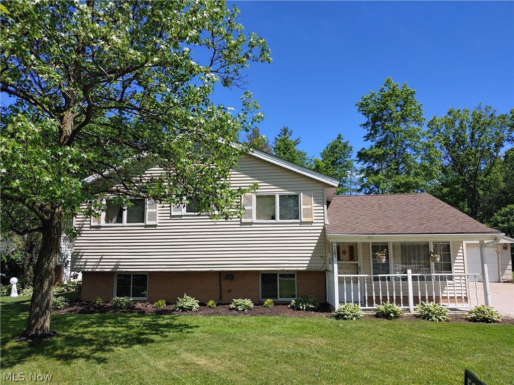 This 4 level split is located on a quiet cul-de-sac and backs up to Finwood Park. No homes in your backyard.  This home needs some love! Fresh paint and little bit of flooring will go a long way!  The main floor features the living room with vaulted ceilings, dining area, kitchen and a half bath. Upstairs has 3 bedrooms, full bath and then you go up again for the 4th bedroom.  The lower area is where all your mechanicals are located, the laundry room and a nice size family/rec room.  The backyard has a covered patio, great for cookouts, a detached 2 car garage, New driveway.  The seller plans on updating the electrical box and siding the garage before closing.