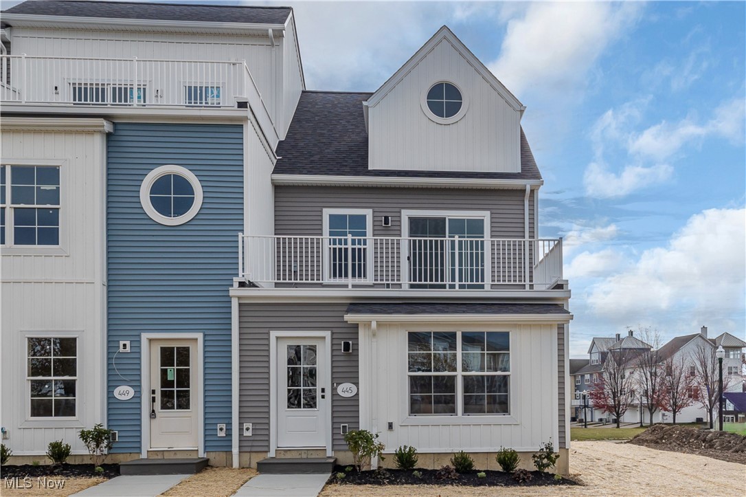 Welcome to Harborwalk Lorain's Premier Waterfront Community! Be the first to enjoy this brand-new, never-lived-in end-unit townhome featuring 3 bedrooms and 3 full bathrooms. The bright, open-concept main level offers durable vinyl flooring throughout and a modern kitchen equipped with quartz countertops, microwave, refrigerator, range and dishwasher, all open to a cozy living area filled with natural light. A spacious first-floor bedroom and full bathroom sits just past the kitchen for added convenience. Upstairs, the primary bedroom includes a generous ensuite with a walk-in shower. An additional bedroom, a full three-piece bath, and a bonus living area with a wet bar complete the upper level. Step out onto your private second-story deck overlooking the river offering front-row views of summer concerts and all the exciting events at Black River Landing. It's the perfect space to relax or entertain. The community includes a pool and fitness center.  The recently remodeled party center can also be rented for a fee.  Located just steps from the Black River, Spitzer and Oasis Marinas, Lake Erie's mile-long pier, and the vibrant Broadway District with its restaurants, coffee shops, and Lorain Brewing Company. This is waterfront living at its finest.