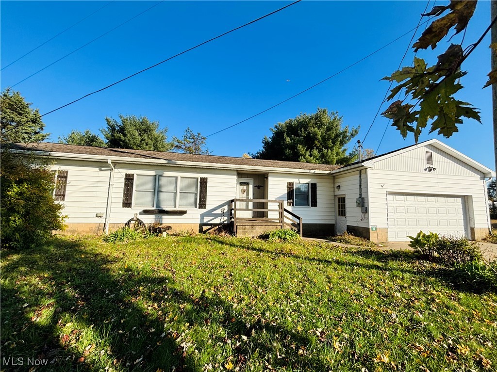 Enjoy peaceful country living in the Warren Local School district with the convenience of being just minutes from downtown Marietta! This well-maintained 3-bedroom, 2-bath ranch is being sold completely furnished at a great value and offers comfort, space, and a quiet setting. Step inside to find a spacious layout with easy flow between kitchen, dining and living areas. The home offers three spacious bedrooms and two full baths, one of which has a large, custom walk-in shower.  Exterior features include an over-sized, two-car garage with room for vehicles, storage or a workshop area and a rear deck overlooking a private backyard. Don't miss your chance to own this inviting home that combines country charm with modern updates and easy access to in-town amenities. Schedule your private showing today and enjoy a new home in time for the holidays!